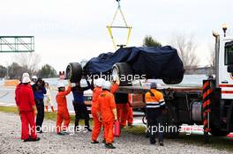 The Scuderia Toro Rosso STR14 of Alexander Albon (THA) Scuderia Toro Rosso is recovered back to the pits on the back of a truck. 19.02.2019. Formula One Testing, Day Two, Barcelona, Spain. Tuesday.
