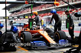Carlos Sainz Jr (ESP) McLaren MCL34 practices a pit stop. 20.02.2019. Formula One Testing, Day Three, Barcelona, Spain. Wednesday.