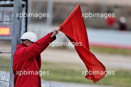 Marshal with a red flag. 20.02.2019. Formula One Testing, Day Three, Barcelona, Spain. Wednesday.