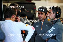 (L to R): Lando Norris (GBR) McLaren with Fernando Alonso (ESP) McLaren and Andrea Stella (ITA) McLaren Performance Director. 26.02.2019. Formula One Testing, Day One, Barcelona, Spain. Tuesday.