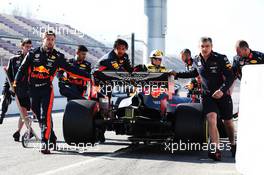 The Red Bull Racing RB15 of Max Verstappen (NLD) Red Bull Racing is recovered back to the pits by mechanics. 27.02.2019. Formula One Testing, Day Two, Barcelona, Spain. Wednesday.