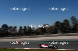 Kimi Raikkonen (FIN) Alfa Romeo Racing C38 leads Max Verstappen (NLD) Red Bull Racing RB14. 27.02.2019. Formula One Testing, Day Two, Barcelona, Spain. Wednesday.