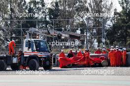 The Ferrari SF90 of Sebastian Vettel (GER) Ferrari is recovered back to the pits on the back of a truck. 27.02.2019. Formula One Testing, Day Two, Barcelona, Spain. Wednesday.