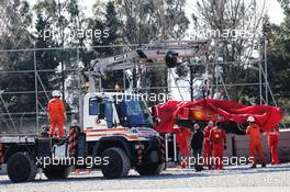 The Ferrari SF90 of Sebastian Vettel (GER) Ferrari is recovered back to the pits on the back of a truck. 27.02.2019. Formula One Testing, Day Two, Barcelona, Spain. Wednesday.