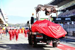 The Ferrari SF90 of Sebastian Vettel (GER) Ferrari is recovered back to the pits on the back of a truck. 27.02.2019. Formula One Testing, Day Two, Barcelona, Spain. Wednesday.