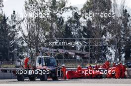 The Ferrari SF90 of Sebastian Vettel (GER) Ferrari is recovered back to the pits on the back of a truck. 27.02.2019. Formula One Testing, Day Two, Barcelona, Spain. Wednesday.