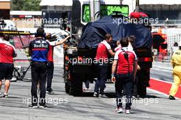 The Alfa Romeo Racing C38 of Callum Ilott (GBR) Alfa Romeo Racing Test Driver is recovered back to the pits on the back of a truck. 14.05.2019. Formula One In Season Testing, Day One, Barcelona, Spain. Tuesday.