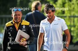 (L to R): Mia Sharizman (MAL) Renault Sport Academy Director with Carlos Sainz Jr (ESP) McLaren. 30.08.2019. Formula 1 World Championship, Rd 13, Belgian Grand Prix, Spa Francorchamps, Belgium, Practice Day.
