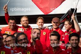 Sebastian Vettel (GER) Ferrari celebrates victory for Charles Leclerc (MON) Ferrari with the team. 01.09.2019. Formula 1 World Championship, Rd 13, Belgian Grand Prix, Spa Francorchamps, Belgium, Race Day.