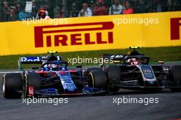 Pierre Gasly (FRA) Scuderia Toro Rosso STR14 and Kevin Magnussen (DEN) Haas VF-19 battle for position. 01.09.2019. Formula 1 World Championship, Rd 13, Belgian Grand Prix, Spa Francorchamps, Belgium, Race Day.