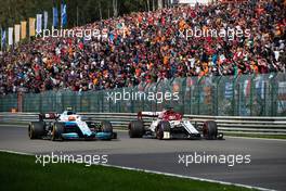 Robert Kubica (POL) Williams Racing FW42 and Kimi Raikkonen (FIN) Alfa Romeo Racing C38 battle for position. 01.09.2019. Formula 1 World Championship, Rd 13, Belgian Grand Prix, Spa Francorchamps, Belgium, Race Day.