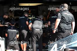 Mercedes AMG F1 mechanics work on the Mercedes AMG F1 W10 of Lewis Hamilton (GBR) Mercedes AMG F1 before the start of qualifying. 31.08.2019. Formula 1 World Championship, Rd 13, Belgian Grand Prix, Spa Francorchamps, Belgium, Qualifying Day.