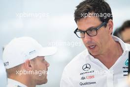 (L to R): Valtteri Bottas (FIN) Mercedes AMG F1 with Toto Wolff (GER) Mercedes AMG F1 Shareholder and Executive Director. 31.08.2019. Formula 1 World Championship, Rd 13, Belgian Grand Prix, Spa Francorchamps, Belgium, Qualifying Day.