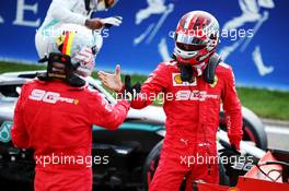 Charles Leclerc (MON) Ferrari celebrates his pole position in qualifying parc ferme with team mate Sebastian Vettel (GER) Ferrari. 31.08.2019. Formula 1 World Championship, Rd 13, Belgian Grand Prix, Spa Francorchamps, Belgium, Qualifying Day.