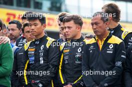 F1, F2, and F3 pay their respects to Anthoine Hubert (L to R): Ye Yifei (CHN) Renault Sport Academy Driver; Max Fewtrell (GBR) Renault Sport Academy Driver; Mia Sharizman (MAL) Renault Sport Academy Director. 01.09.2019. Formula 1 World Championship, Rd 13, Belgian Grand Prix, Spa Francorchamps, Belgium, Race Day.
