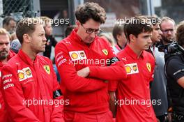 F1, F2, and F3 pay their respects to Anthoine Hubert Sebastian Vettel (GER) Ferrari; Mattia Binotto (ITA) Ferrari Team Principal and Charles Leclerc (MON) Ferrari. 01.09.2019. Formula 1 World Championship, Rd 13, Belgian Grand Prix, Spa Francorchamps, Belgium, Race Day.