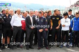 F1, F2, and F3 pay their respects to Anthoine Hubert: Bruno Michel (FRA) F2 CEO; Chase Carey (USA) Formula One Group Chairman; and Christian Horner (GBR) Red Bull Racing Team Principal. 01.09.2019. Formula 1 World Championship, Rd 13, Belgian Grand Prix, Spa Francorchamps, Belgium, Race Day.