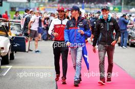 (L to R): Antonio Giovinazzi (ITA) Alfa Romeo Racing; Daniil Kvyat (RUS) Scuderia Toro Rosso; and George Russell (GBR) Williams Racing, on the drivers parade. 01.09.2019. Formula 1 World Championship, Rd 13, Belgian Grand Prix, Spa Francorchamps, Belgium, Race Day.