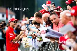 Sebastian Vettel (GER) Ferrari signs autographs for the fans. 29.08.2019. Formula 1 World Championship, Rd 13, Belgian Grand Prix, Spa Francorchamps, Belgium, Preparation Day.