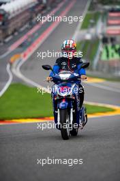 Pierre Gasly (FRA) Scuderia Toro Rosso rides the circuit on a scooter. 29.08.2019. Formula 1 World Championship, Rd 13, Belgian Grand Prix, Spa Francorchamps, Belgium, Preparation Day.
