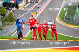 Sebastian Vettel (GER) Ferrari runs up Eau Rouge with the team. 29.08.2019. Formula 1 World Championship, Rd 13, Belgian Grand Prix, Spa Francorchamps, Belgium, Preparation Day.