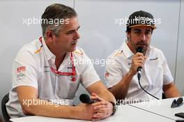 (L to R): Gil de Ferran (BRA) McLaren Sporting Director with Fernando Alonso (ESP) McLaren. 29.03.2019. Formula 1 World Championship, Rd 2, Bahrain Grand Prix, Sakhir, Bahrain, Practice Day