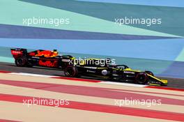 Daniel Ricciardo (AUS) Renault F1 Team RS19 and Max Verstappen (NLD) Red Bull Racing RB15. 29.03.2019. Formula 1 World Championship, Rd 2, Bahrain Grand Prix, Sakhir, Bahrain, Practice Day
