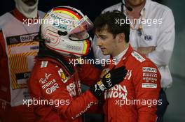 Sebastian Vettel (GER) Ferrari and Charles Leclerc (MON) Ferrari. 31.03.2019. Formula 1 World Championship, Rd 2, Bahrain Grand Prix, Sakhir, Bahrain, Race Day.