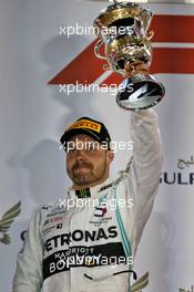 Valtteri Bottas (FIN) Mercedes AMG F1 celebrates his second position on the podium. 31.03.2019. Formula 1 World Championship, Rd 2, Bahrain Grand Prix, Sakhir, Bahrain, Race Day.