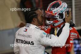 Lewis Hamilton (GBR) Mercedes AMG F1 W10 and Charles Leclerc (MON) Ferrari. 31.03.2019. Formula 1 World Championship, Rd 2, Bahrain Grand Prix, Sakhir, Bahrain, Race Day.