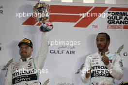 Valtteri Bottas (FIN) Mercedes AMG F1 and Lewis Hamilton (GBR) Mercedes AMG F1. 31.03.2019. Formula 1 World Championship, Rd 2, Bahrain Grand Prix, Sakhir, Bahrain, Race Day.