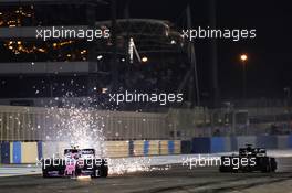 Lance Stroll (CDN) Racing Point F1 Team RP19 and Romain Grosjean (FRA) Haas F1 Team VF-19 with damage at the start of the race. 31.03.2019. Formula 1 World Championship, Rd 2, Bahrain Grand Prix, Sakhir, Bahrain, Race Day.