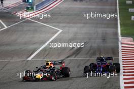Pierre Gasly (FRA) Red Bull Racing RB15 and Alexander Albon (THA) Scuderia Toro Rosso STR14. 31.03.2019. Formula 1 World Championship, Rd 2, Bahrain Grand Prix, Sakhir, Bahrain, Race Day.