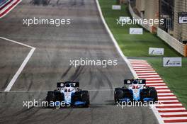 (L to R): George Russell (GBR) Williams Racing FW42 and Robert Kubica (POL) Williams Racing FW42 battle for position. 31.03.2019. Formula 1 World Championship, Rd 2, Bahrain Grand Prix, Sakhir, Bahrain, Race Day.