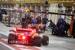 Carlos Sainz Jr (ESP) McLaren MCL34 pit stop. 31.03.2019. Formula 1 World Championship, Rd 2, Bahrain Grand Prix, Sakhir, Bahrain, Race Day.