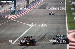 Max Verstappen (NLD) Red Bull Racing RB15 and Valtteri Bottas (FIN) Mercedes AMG F1 W10. 31.03.2019. Formula 1 World Championship, Rd 2, Bahrain Grand Prix, Sakhir, Bahrain, Race Day.