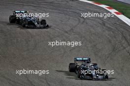 Lewis Hamilton (GBR) Mercedes AMG F1 W10 leads team mate Valtteri Bottas (FIN) Mercedes AMG F1 W10. 31.03.2019. Formula 1 World Championship, Rd 2, Bahrain Grand Prix, Sakhir, Bahrain, Race Day.