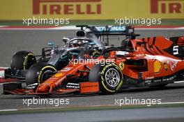 Sebastian Vettel (GER), Scuderia Ferrari and Lewis Hamilton (GBR), Mercedes AMG F1   31.03.2019. Formula 1 World Championship, Rd 2, Bahrain Grand Prix, Sakhir, Bahrain, Race Day.