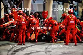 Sebastian Vettel (GER) Ferrari SF90 makes a pit stop to replace a broken front wing. 31.03.2019. Formula 1 World Championship, Rd 2, Bahrain Grand Prix, Sakhir, Bahrain, Race Day.
