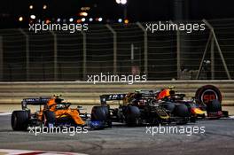 (L to R): Lando Norris (GBR) McLaren MCL34; Kevin Magnussen (DEN) Haas VF-19; and Pierre Gasly (FRA) Red Bull Racing RB15, battle for position. 31.03.2019. Formula 1 World Championship, Rd 2, Bahrain Grand Prix, Sakhir, Bahrain, Race Day.