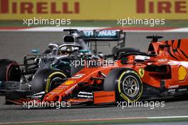 Sebastian Vettel (GER), Scuderia Ferrari and Lewis Hamilton (GBR), Mercedes AMG F1   31.03.2019. Formula 1 World Championship, Rd 2, Bahrain Grand Prix, Sakhir, Bahrain, Race Day.