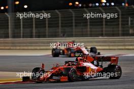Charles Leclerc (MON) Ferrari SF90 leads team mate Sebastian Vettel (GER) Ferrari SF90. 31.03.2019. Formula 1 World Championship, Rd 2, Bahrain Grand Prix, Sakhir, Bahrain, Race Day.