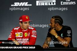(L to R): Charles Leclerc (MON) Ferrari with Lewis Hamilton (GBR) Mercedes AMG F1 in the post qualifying FIA Press Conference. 30.03.2019. Formula 1 World Championship, Rd 2, Bahrain Grand Prix, Sakhir, Bahrain, Qualifying Day.