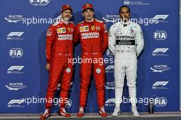 Qualifying top three in parc ferme (L to R): Sebastian Vettel (GER) Ferrari, second; Charles Leclerc (MON) Ferrari, pole position; Lewis Hamilton (GBR) Mercedes AMG F1, third. 30.03.2019. Formula 1 World Championship, Rd 2, Bahrain Grand Prix, Sakhir, Bahrain, Qualifying Day.