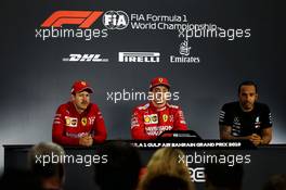 The post qualifying top three in the FIA Press Conference (L to R): Sebastian Vettel (GER) Ferrari, second; Charles Leclerc (MON) Ferrari, pole position; Lewis Hamilton (GBR) Mercedes AMG F1, third. 30.03.2019. Formula 1 World Championship, Rd 2, Bahrain Grand Prix, Sakhir, Bahrain, Qualifying Day.