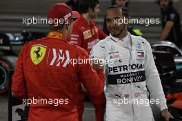 Sebastian Vettel (GER) Ferrari and Lewis Hamilton (GBR) Mercedes AMG F1. 30.03.2019. Formula 1 World Championship, Rd 2, Bahrain Grand Prix, Sakhir, Bahrain, Qualifying Day.