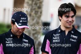 (L to R): Sergio Perez (MEX) Racing Point F1 Team with team mate Lance Stroll (CDN) Racing Point F1 Team. 28.03.2019. Formula 1 World Championship, Rd 2, Bahrain Grand Prix, Sakhir, Bahrain, Preparation Day.