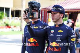 Pierre Gasly (FRA) Red Bull Racing and Max Verstappen (NLD) Red Bull Racing. 28.03.2019. Formula 1 World Championship, Rd 2, Bahrain Grand Prix, Sakhir, Bahrain, Preparation Day.