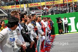 The drivers as the grid observes the national anthem. 17.11.2019. Formula 1 World Championship, Rd 20, Brazilian Grand Prix, Sao Paulo, Brazil, Race Day.