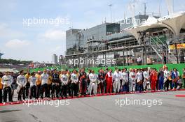 The drivers as the grid observes the national anthem. 17.11.2019. Formula 1 World Championship, Rd 20, Brazilian Grand Prix, Sao Paulo, Brazil, Race Day.